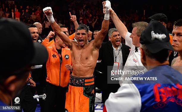 Amir Khan of Great Britain reacts after defeating Julio Diaz of Mexico during their 143lbs Catchweight Contest at the Motorpoint Arena in Sheffield,...