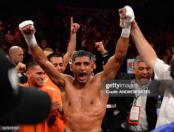 Amir Khan of Great Britain reacts after defeating Julio Diaz of Mexico during their 143lbs Catchweight Contest at the Motorpoint Arena in Sheffield,...