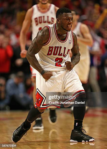 Nate Robinson of the Chicago Bulls celebrates after hitting a shot against the Brooklyn Nets in Game Five of the Eastern Conference Quarterfinals in...