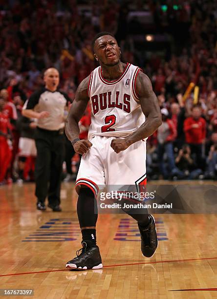 Nate Robinson of the Chicago Bulls celebrates after hitting a shot against the Brooklyn Nets in Game Five of the Eastern Conference Quarterfinals in...