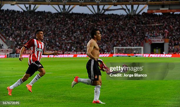 Maximiliano Núñez and Jonathan Silva of Estudiantes de La Plata celebrate a goal during a match between Estudiantes de La Plata and Boca Juniors as...