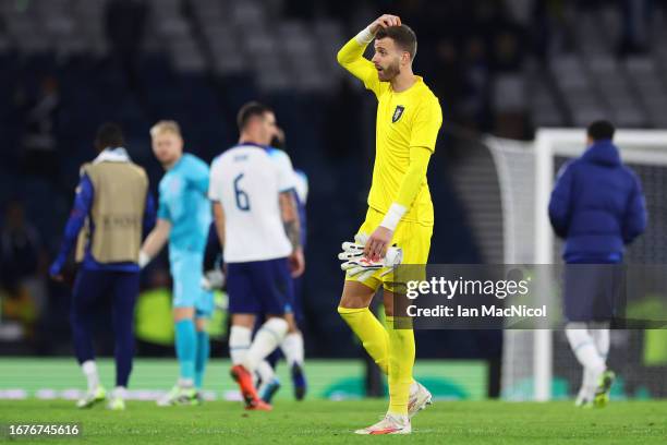 Angus Gunn of Scotland looks dejected following the team's defeat during the 150th Anniversary Heritage Match between Scotland and England at Hampden...