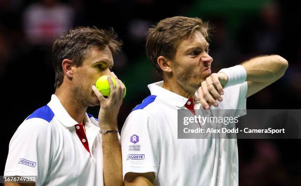 Nicolas Mahut and Edouard Roger-Vasselin of France in action during the Davis Cup Final Group B doubles match at the AO Arena on September 17, 2023...