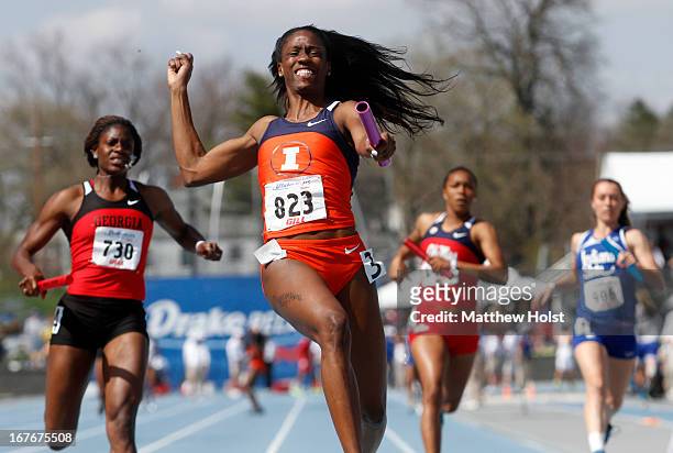 Ashley Spencer, of the Illinois Illini, celebrates after anchoring the Women's 4x100-meter relay at the Drake Relays, on April 27, 2013 at Drake...