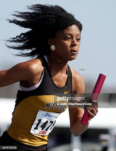 Jasmine Webb, of the Missouri Tigers takes off with the baton competing in the Women's Sprint Medley at the Drake Relays, on April 27, 2013 at Drake...