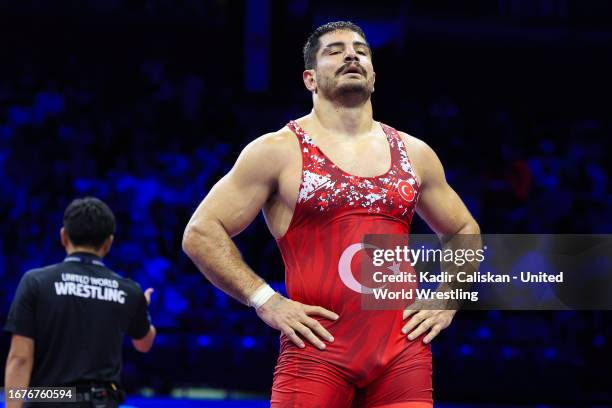 Taha Akgul of Turkiye looks on Amir Hossein Abbas Zare from Iran in semifinals at 125kg during 2023 World Wrestling Championship in Belgrade, Serbia...