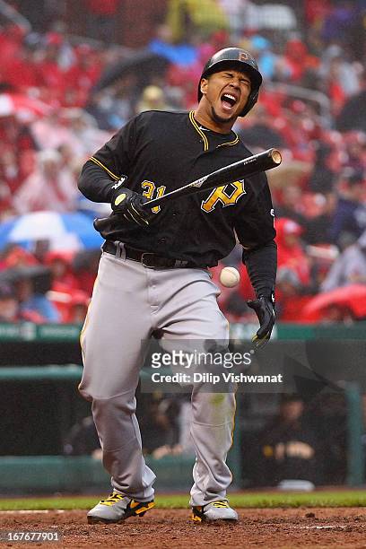 Jose Tabata of the Pittsburgh Pirates reacts after being hit by a pitch from Trevor Rosenthal of the St. Louis Cardinals in the seventh inning at...