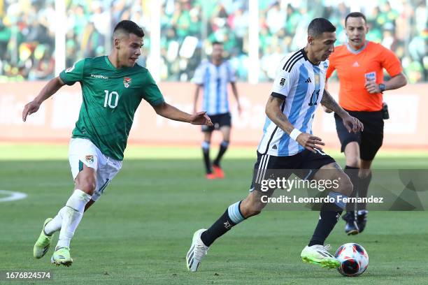 Angel Di Maria of Argentina competes for the ball with Moises Villarroel of Bolivia during a FIFA World Cup 2026 Qualifier match between Bolivia and...