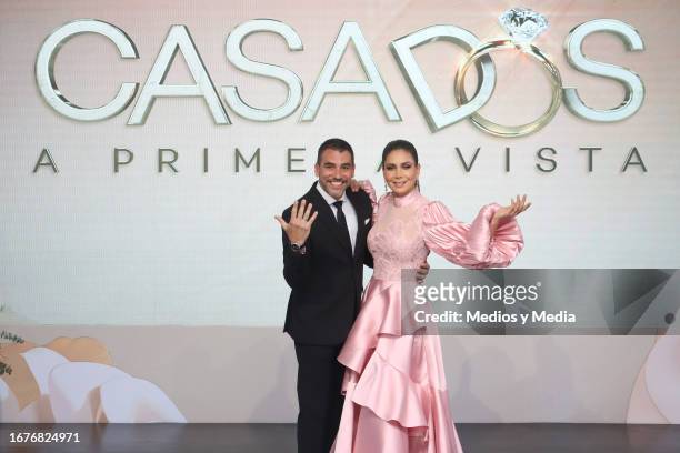 Mauricio Barcelata and Patricia Manterola pose for photos during the press conference to present the reality show 'Casados a Primera Vista' at Azteca...