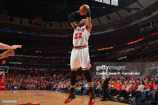 Taj Gibson of the Chicago Bulls shoots a jump shot against the Brooklyn Nets in Game Four of the Eastern Conference Quarterfinals during the 2013 NBA...