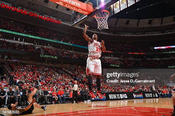 Jimmy Butler of the Chicago Bulls goes up for the layup against the Brooklyn Nets in Game Four of the Eastern Conference Quarterfinals during the...