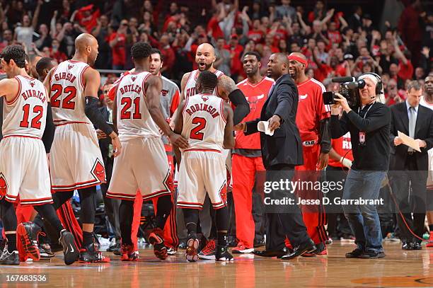 Members of the Chicago Bulls get pumped up against the Brooklyn Nets in Game Four of the Eastern Conference Quarterfinals during the 2013 NBA...