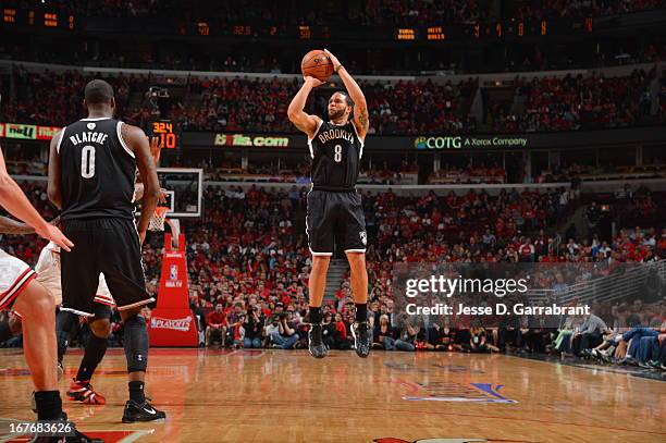 Deron Williams of the Brooklyn Nets shoots the ball against the Chicago Bulls in Game Four of the Eastern Conference Quarterfinals during the 2013...