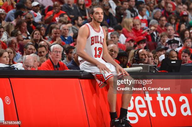 Joakim Noah of the Chicago Bulls waits to get into the game against the Brooklyn Nets in Game Four of the Eastern Conference Quarterfinals during the...