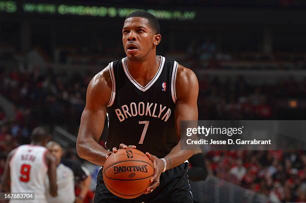 Joe Johnson of the Brooklyn Nets shoots a foul shot against the Chicago Bulls in Game Four of the Eastern Conference Quarterfinals during the 2013...