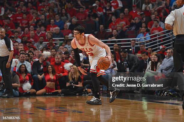 Kirk Hinrich of the Chicago Bulls dribbles the ball against the Brooklyn Nets in Game Four of the Eastern Conference Quarterfinals during the 2013...