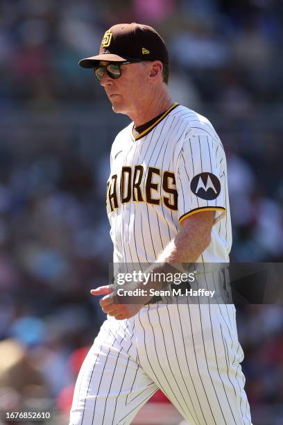 Manager Bob Melvin returns to the dugout after taking Rich Hill of the San Diego Padres out of the game during the fifth inning of a game against the...