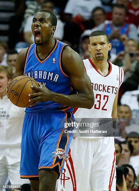 Serge Ibaka of the Oklahoma City Thunder celebrates a play against Francisco Garcia of the Houston Rockets in Game Three of the Western Conference...