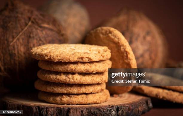 cookies with coconut and cinnamon - coconut biscuits stockfoto's en -beelden