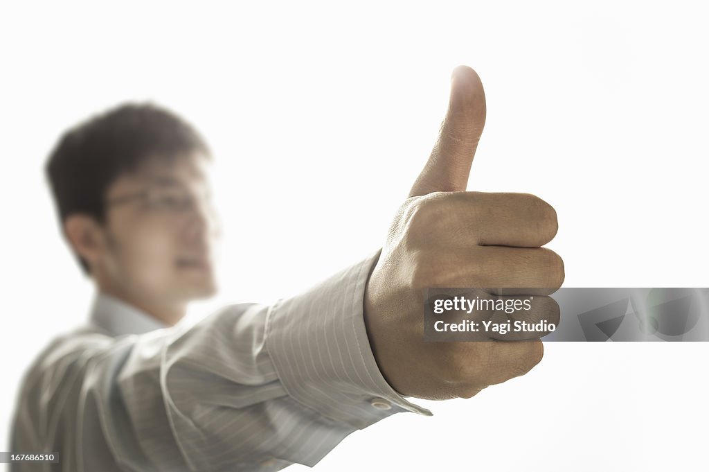 Man showing us thumb up gesture