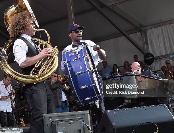 Billy Joel is joined by Preservation Hall Jazz Band of New Orleans and perform during the 2013 New Orleans Jazz & Heritage Music Festival at Fair...