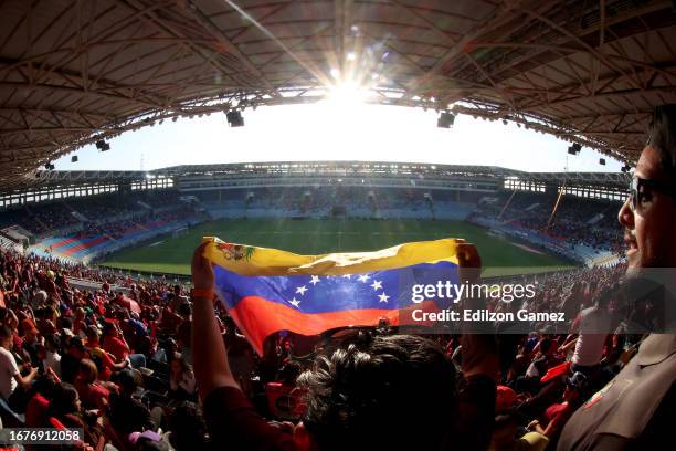 Fans of Venezuela cheer prior to a FIFA World Cup 2026 Qualifier match between Venezuela and Paraguay at Estadio Monumental de Maturin on September...