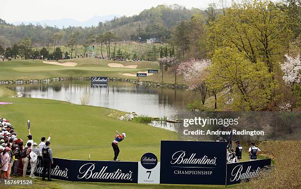 Alexander Noren of Sweden hits his tee-shot on the seventh hole during the final round of the Ballantine's Championship at Blackstone Golf Club on...