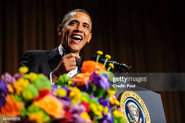 President Barack Obama tells jokes poking fun at himself as well as others during the White House Correspondents' Association Dinner on April 27,...