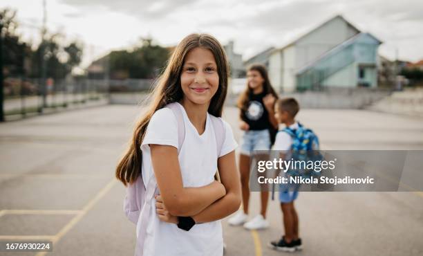 elementary students on the basketball court - cute college girl stock pictures, royalty-free photos & images