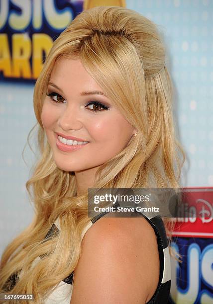 Olivia Holt arrives at the 2013 Radio Disney Music Awards at Nokia Theatre L.A. Live on April 27, 2013 in Los Angeles, California.