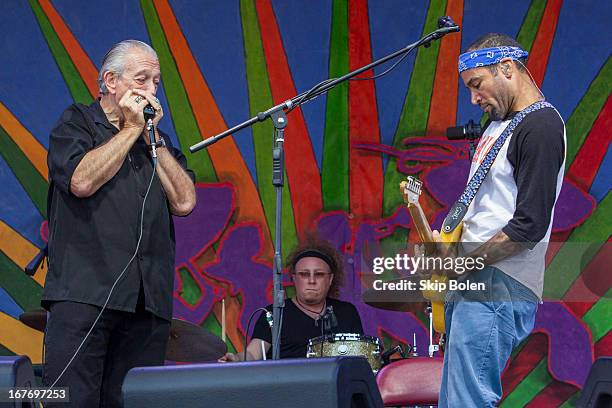 Charlie Musselwhite and Ben Harper performs during the 2013 New Orleans Jazz & Heritage Music Festival at Fair Grounds Race Course on April 27, 2013...