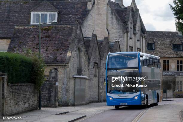 Local public transport bus service on 13th September 2023 in Cirencester, United Kingdom. Cirencester is a market town in Gloucestershire. It is the...