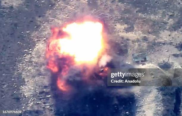 Screen grab captured from a video shows smoke rising after Azerbaijan started 'anti-terror activities' in Karabakh to uphold the provisions outlined...