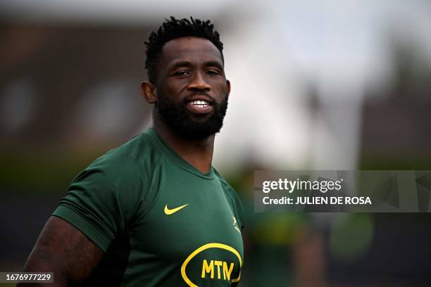 South Africa's flanker and captain Siya Kolisi takes part in a training session at Fauvettes Stadium, in Domont, north of Paris, on September 19 as...