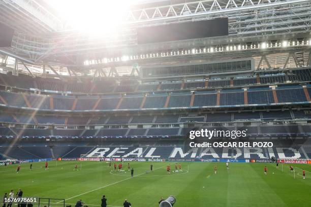 Union Berlin's players attend a training session on the eve of the UEFA Champions League football match between Real Madrid and Union Berlin at the...