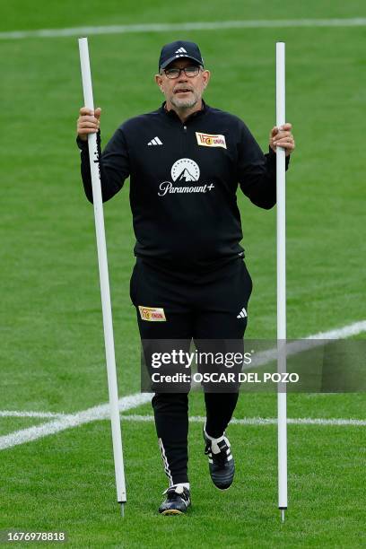 Union Berlin's Swiss head coach Urs Fischer attends a training session on the eve of the UEFA Champions League football match between Real Madrid and...