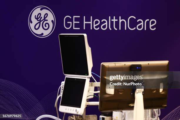 HealthCare logo and medical equipment are seen exhibit on medical conference in Krakow, Poland on September 15, 2023.