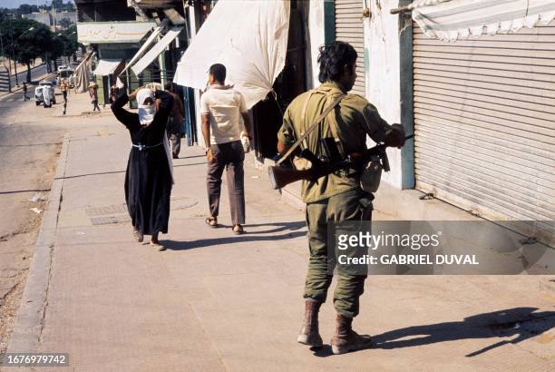 An Israeli soldier patrol a street of Gaza on October 21 during the 1973 ArabIsraeli War. On October 6 on the Jewish holiday of Yom Kippur, an Arab...