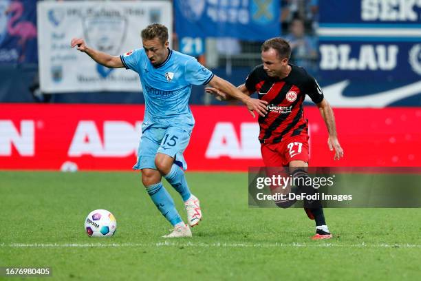 Felix Passlack of VfL Bochum and Mario Goetze of Eintracht Frankfurt battle for the Ball during the Bundesliga match between VfL Bochum 1848 and...