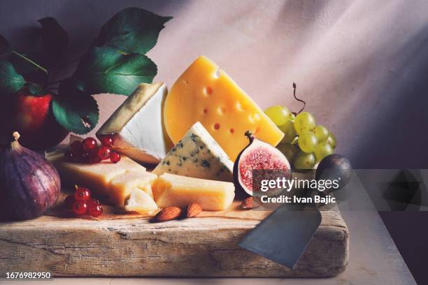 rustic cheese collection - green apple slices stock pictures, royalty-free photos & images