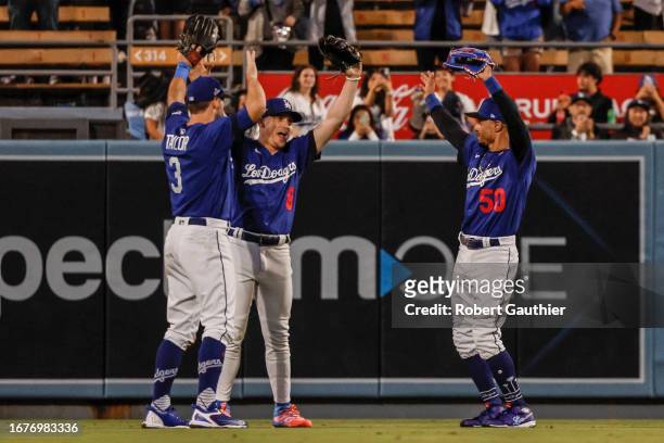 Los Angeles, CA, Monday, September 18, 2023 - Dodgers outfielders Chris Taylor, left, Kike´Hernandez, center and Mookie Betts celebrate an 8-3 win...