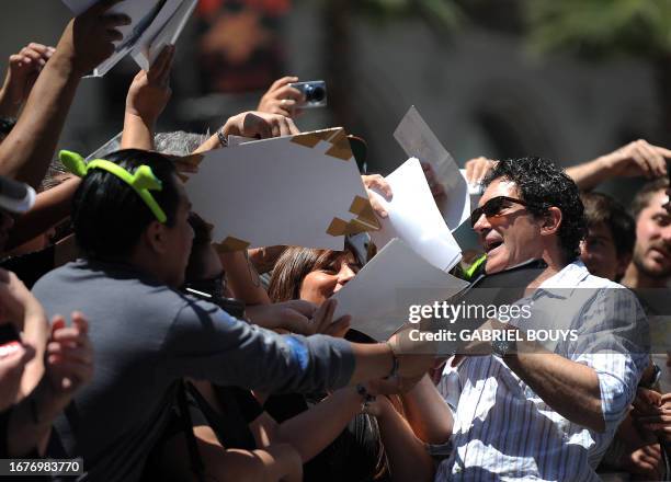 Actor Antonio Banderas signs autographs after a ceremony to honor Shrek with a Star on the Hollywood Walk of Fame in Hollywood, California on May 20,...