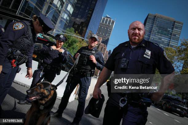 Officers stand guard outside the United Nations headquarters during the 78th session of the United Nations General Assembly on September 19, 2023 in...