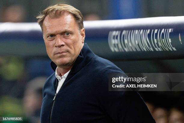 Shakhtar Donetsk's Dutch coach Patrick van Leeuwen follows the action from the sidelines during the UEFA Champions League Group H football match...