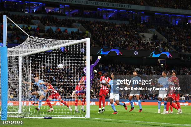 Omri Glazer of Red Star Belgrade / FK Crvena Zvezda fumbles the ball as Julian Alvarez of Manchester City scores a goal to make it 2-1 during the...