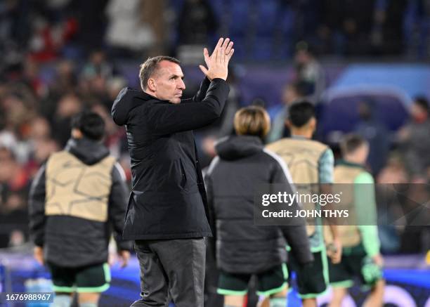 Celtic's Irish head coach Brendan Rodgers reacts at the end of the UEFA Champions League Group E football match between Feyenoord and Celtic FC at...