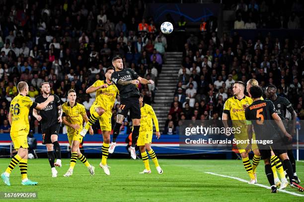 Lucas Hernandez of Paris Saint Germain heads the ball during the UEFA Champions League Group Stage Group F match between Paris Saint-Germain and...