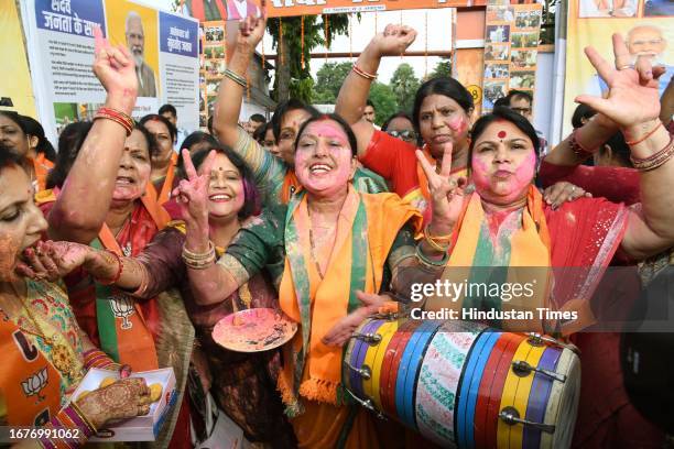 Mahila Morcha activists celebrating after the Women's reservation bill introduced in the Parliament at BJP office on September 19, 2023 in Patna,...