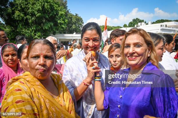 Congress leader Alka Lamba along with supporters celebrates to thank Congress leader Sonia Gandhi for her constant pursual on Women Reservation Bill...