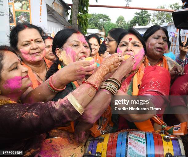 Mahila Morcha activists celebrating after the Women's reservation bill introduced in the Parliament at BJP office on September 19, 2023 in Patna,...